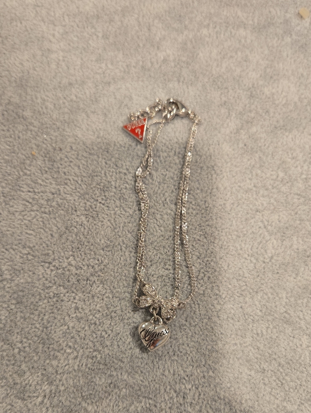 Guess Silver Heart Bracelet with Red Triangle Logo